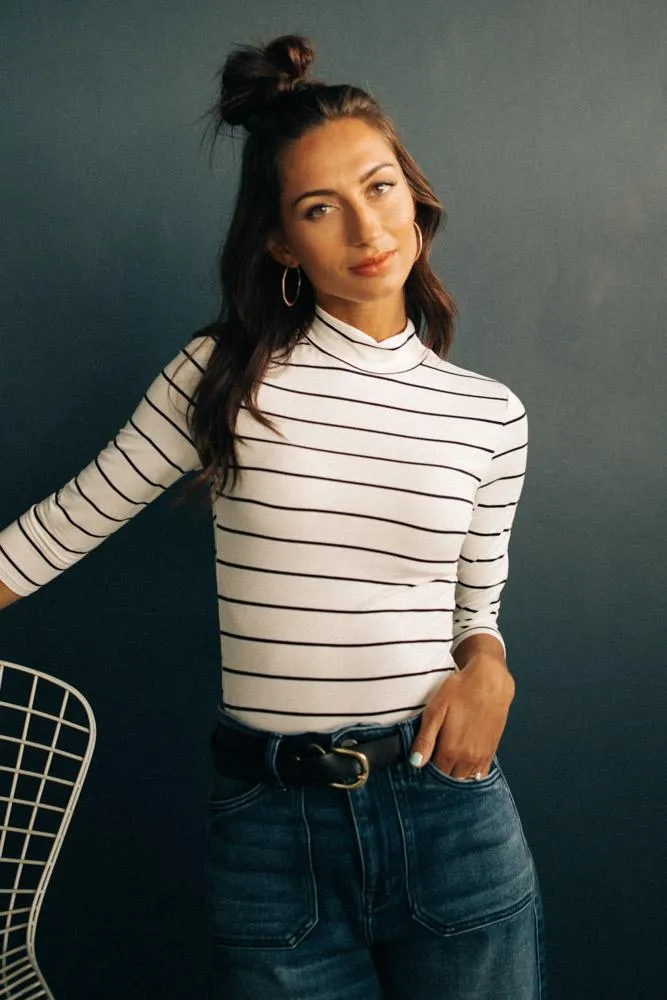 This Chic White and Black Mock Neck Top